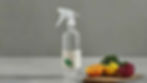 Spray bottle of environmentally sustainable cleaner on a counter top.